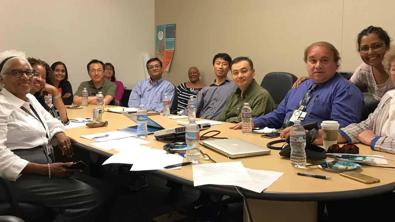 Photo of researchers at conference table